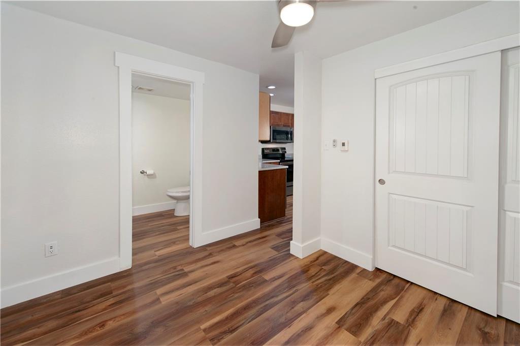 396 Cove Boulevard, Unit 12 Dillon, CO 80435 - Photo 11 of 20 a view of a room with wooden floor and bathroom view