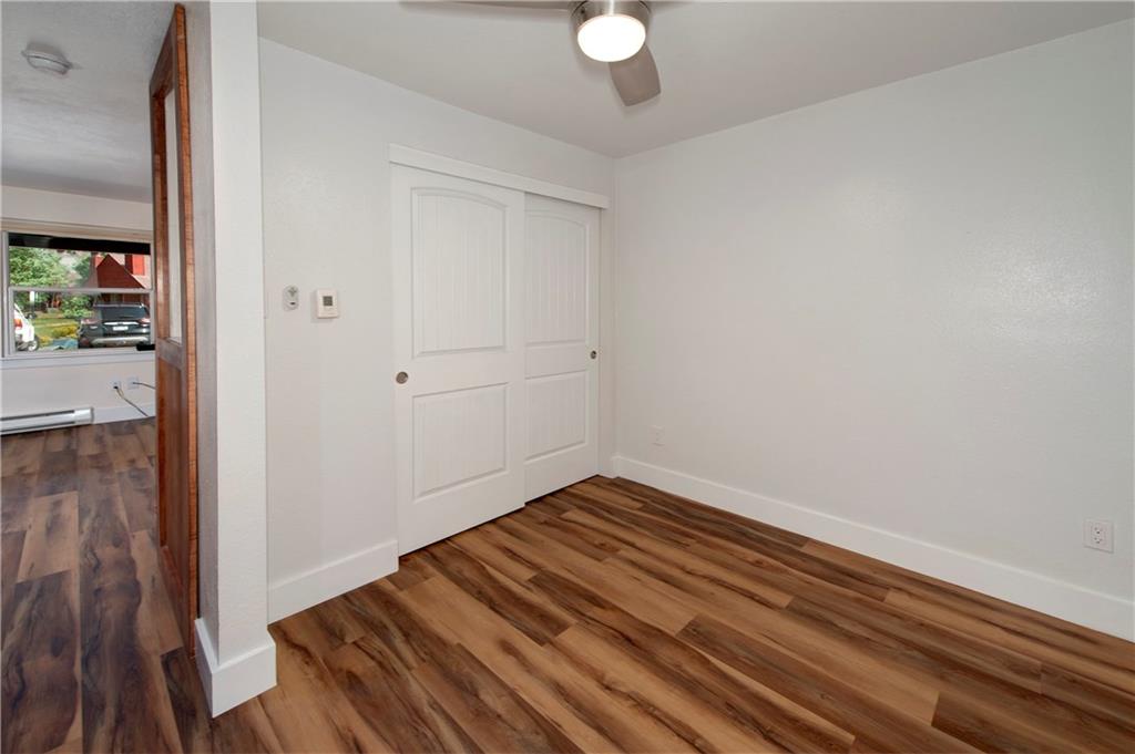 396 Cove Boulevard, Unit 12 Dillon, CO 80435 - Photo 12 of 20 a view of room with wooden floor