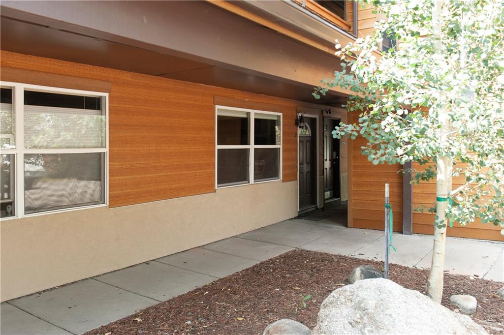 396 Cove Boulevard, Unit 12 Dillon, CO 80435 - Photo 18 of 20 a front view of a house with a garage