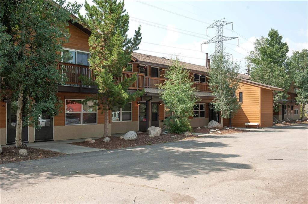 396 Cove Boulevard, Unit 12 Dillon, CO 80435 - Photo 19 of 20 a view of a house with a yard