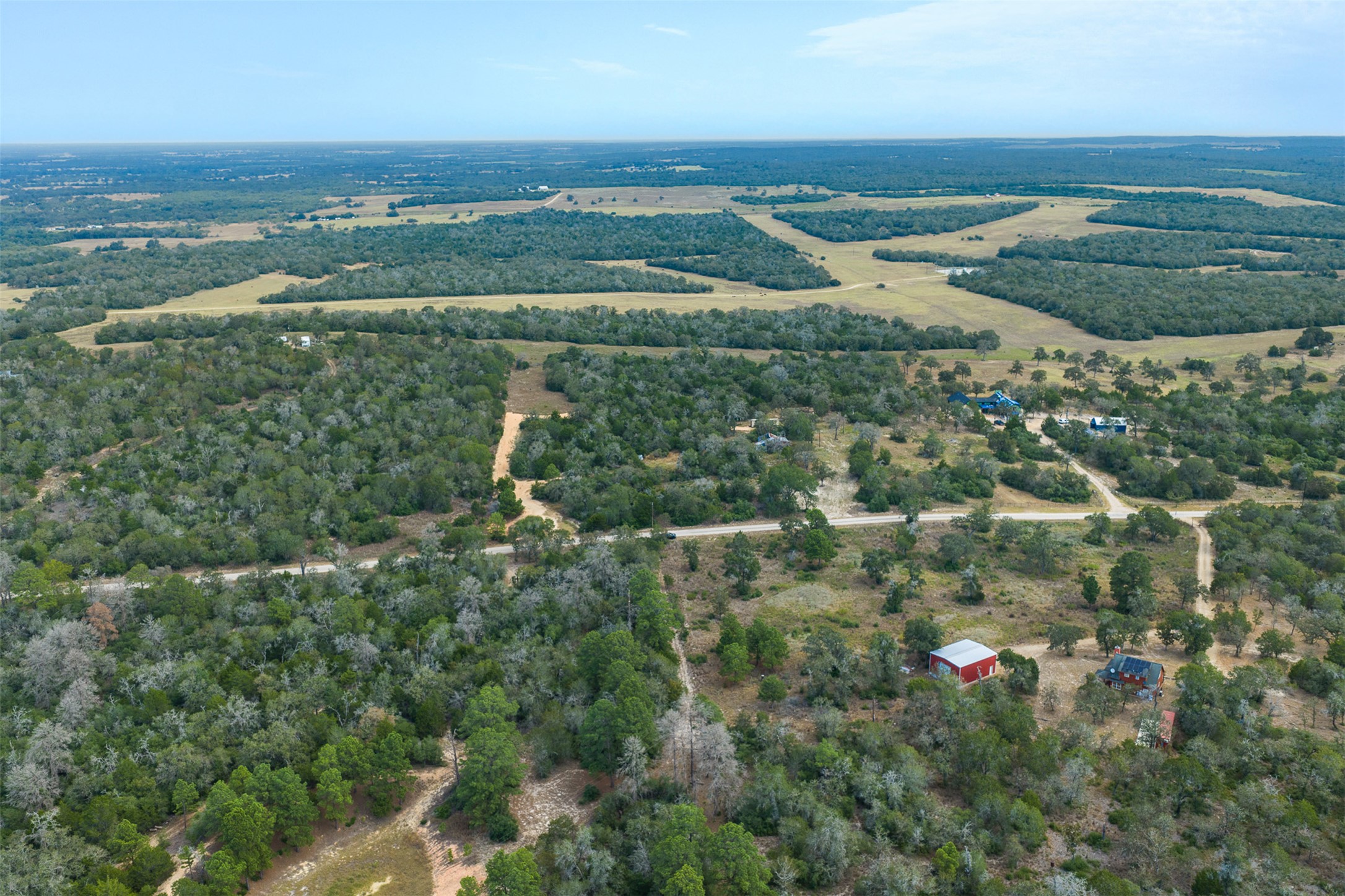 3301 Chuckwagon Road Harwood, TX 78632 - Photo 19 of 36 Mature woodlands and open pastures define this sweeping countryside landscape.