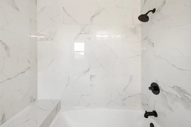 a bathroom with a bathtub