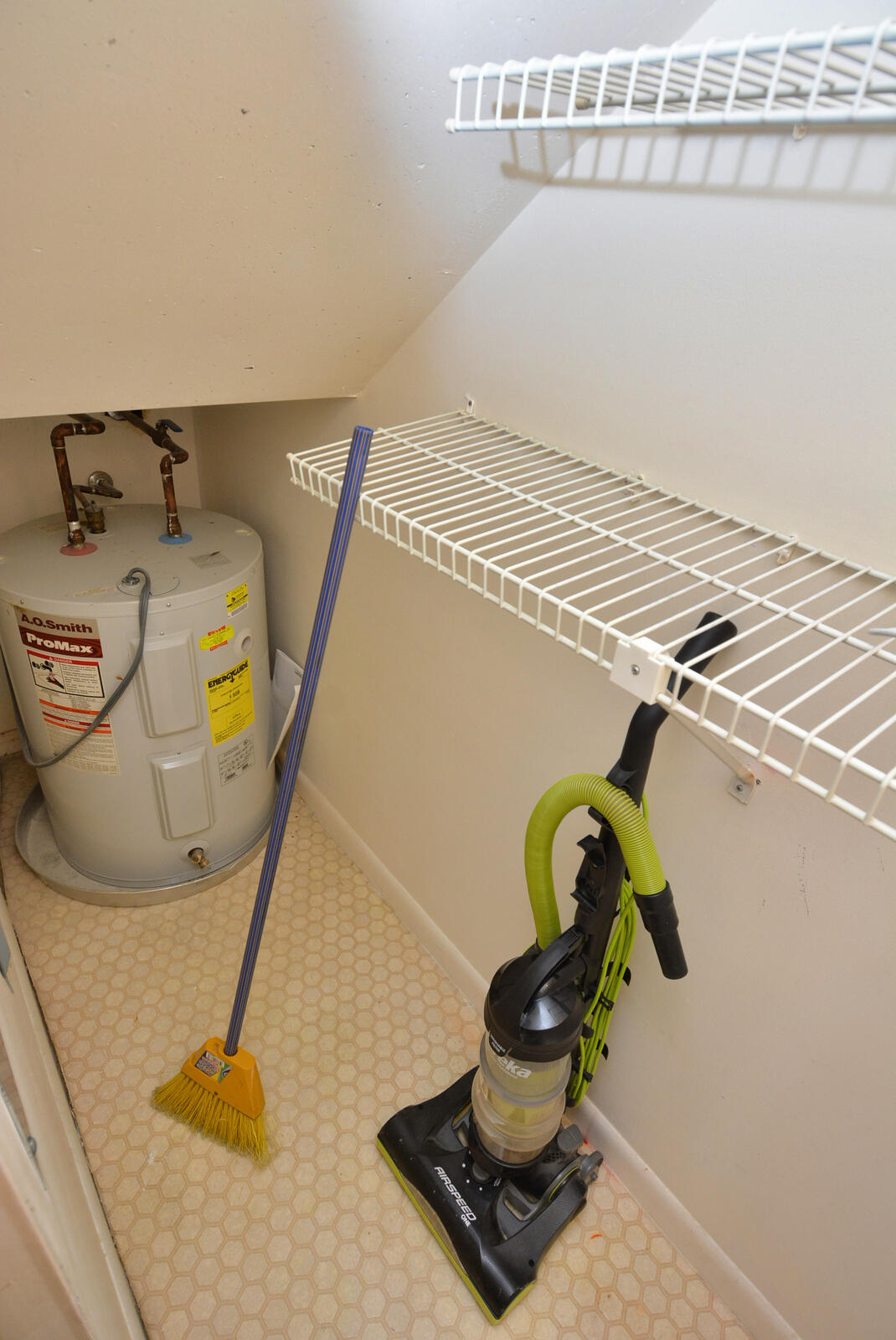 5806 Southeast Windsong Lane, Unit 217 Stuart, FL 34997 - Photo 12 of 42 a view of utility room