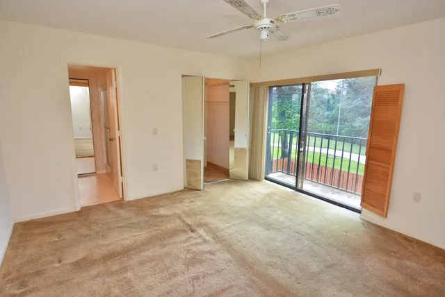 a view of a room with a large windows