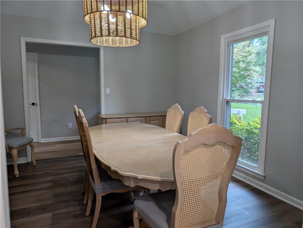 402 Pheasant Run Rome, GA 30161 - Photo 27 of 74 a view of a dining room with furniture and wooden floor