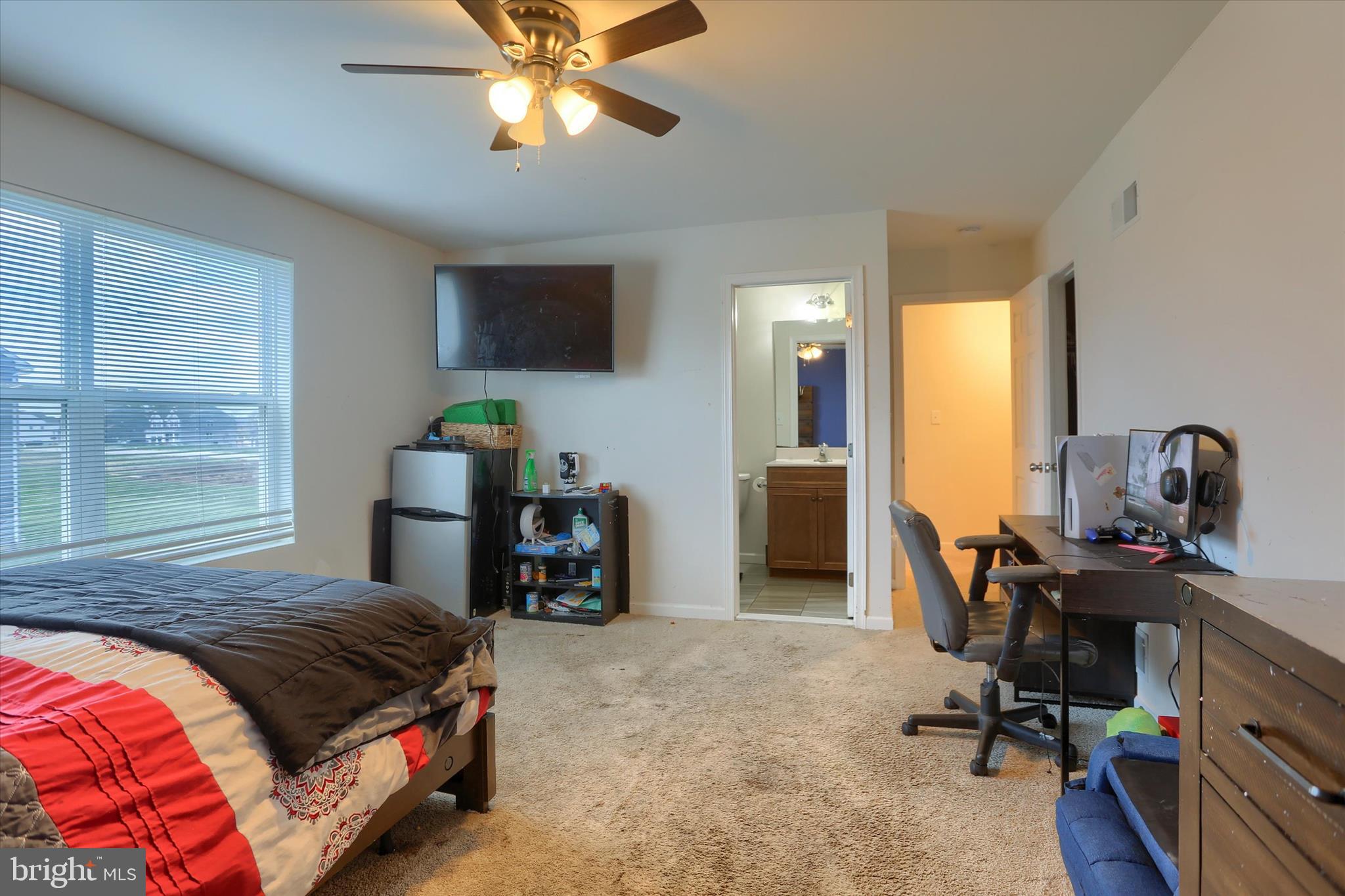 515 Darrow Road York, PA 17404 - Photo 22 of 41 a bedroom with a bed and a chandelier