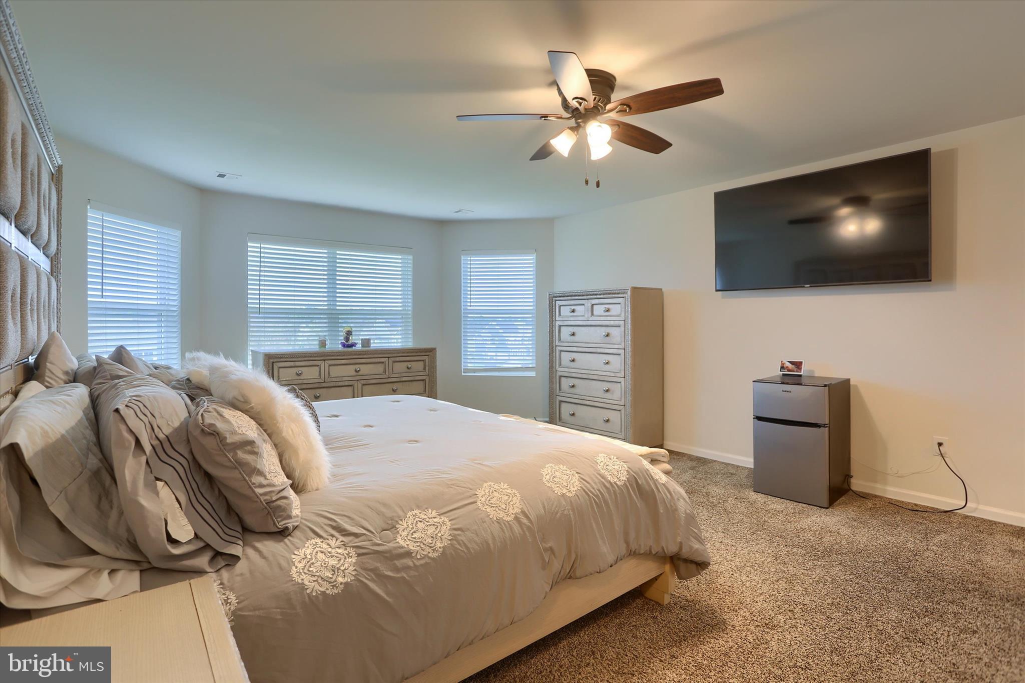 515 Darrow Road York, PA 17404 - Photo 26 of 41 a bedroom with a bed and a flat screen tv