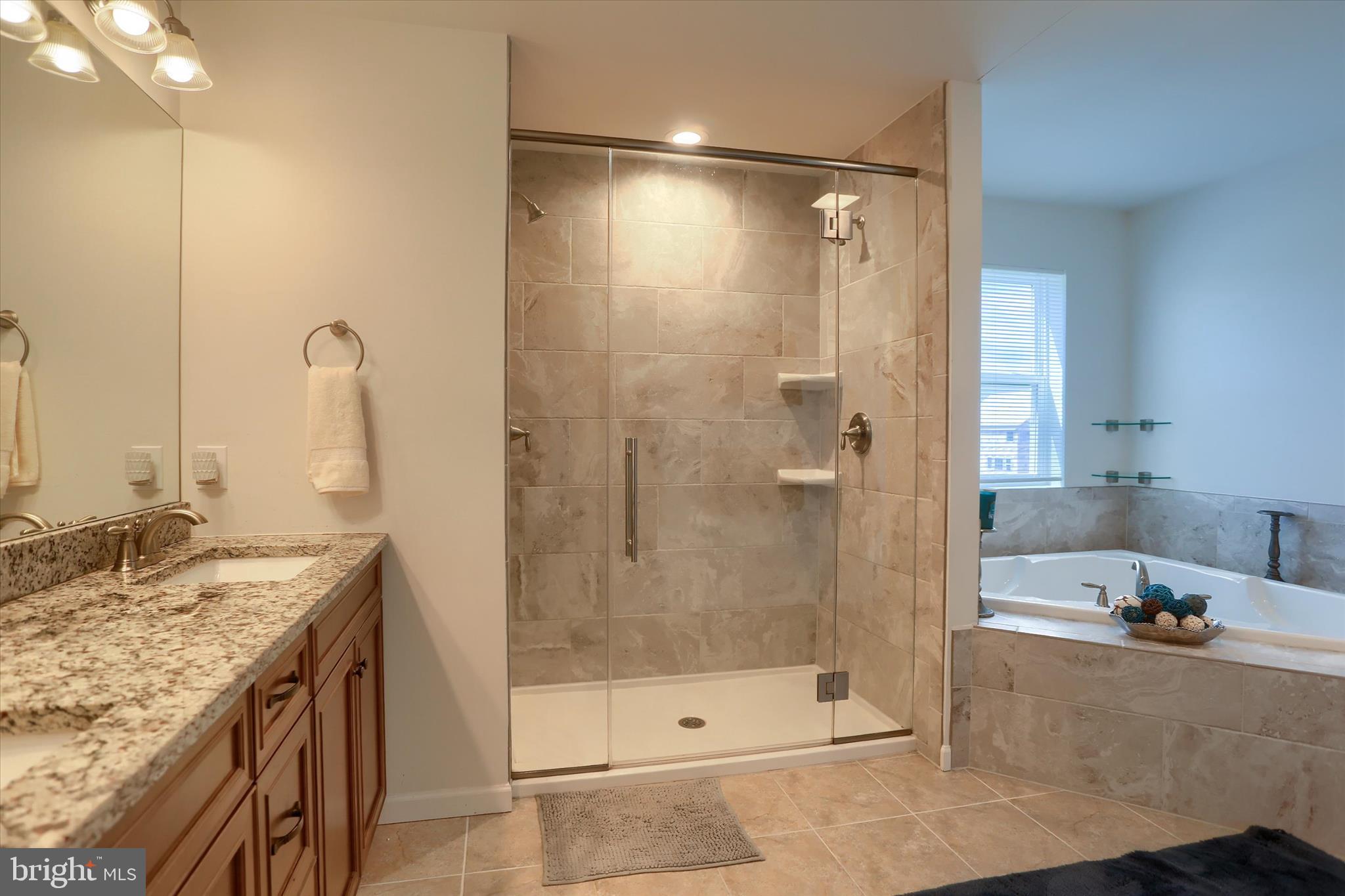 515 Darrow Road York, PA 17404 - Photo 5 of 41 a bathroom with a granite countertop sink a toilet and shower