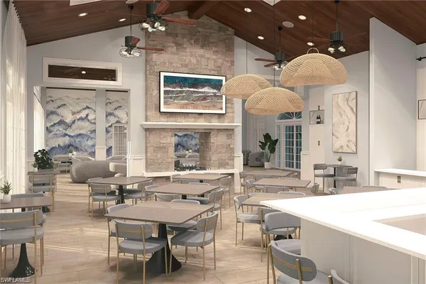 a view of a dining room with furniture and chandelier