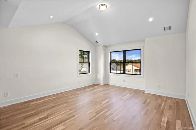 a view of staircase with large window