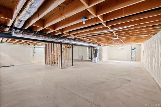 a view of hallway with wooden floor