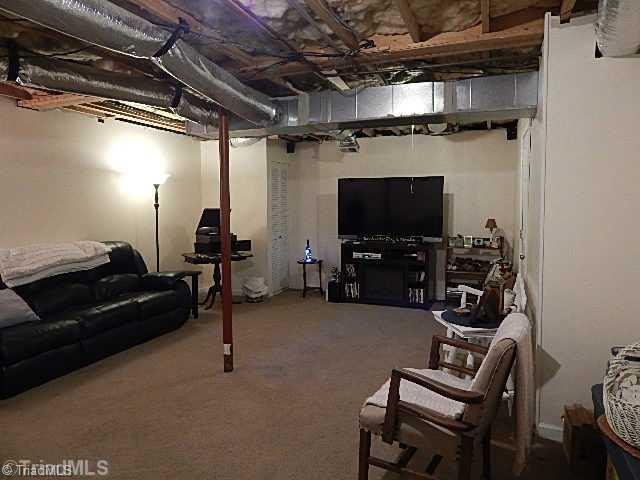 4036 Flat Shoals Road Germanton, NC 27019 - Photo 11 of 16 Den/Family/Great Room. Den partially finished in basement. Great media room.