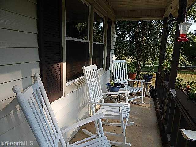 4036 Flat Shoals Road Germanton, NC 27019 - Photo 14 of 16 Other. Rocking chair front porch.