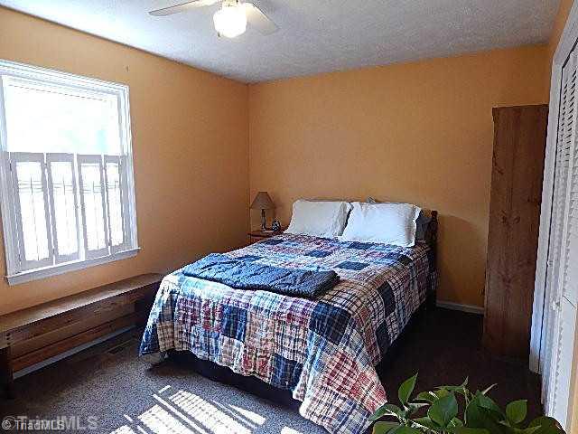 4036 Flat Shoals Road Germanton, NC 27019 - Photo 8 of 16 2nd Bedroom. Spacious guest bedrooms.
