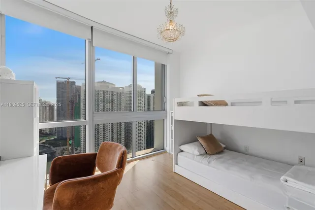 a bathroom with a toilet sink and shower