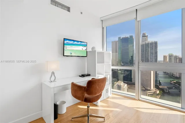 a bathroom with a toilet sink and shower