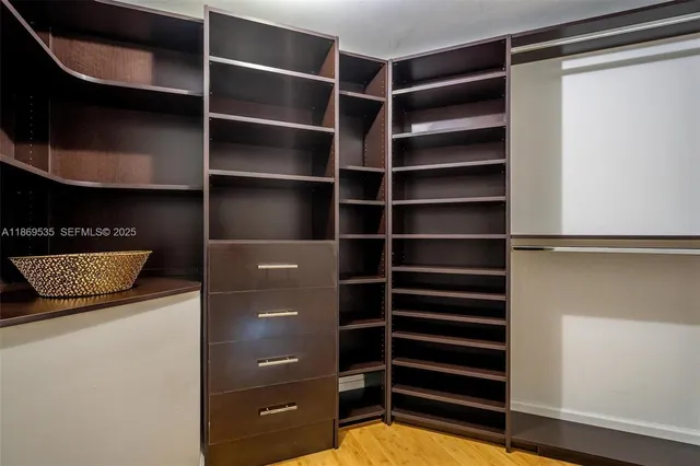 a city view with tall buildings and a yard