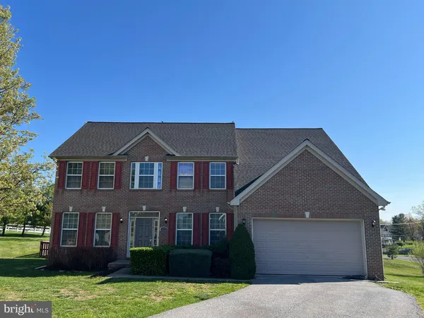 a front view of a house with a balcony