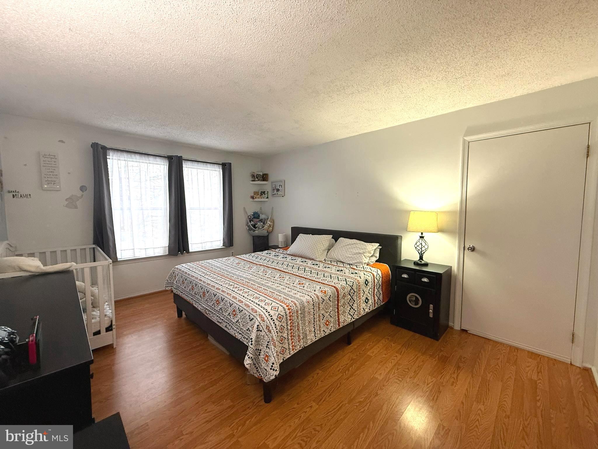 12 Juniper Way Hamilton, NJ 08619 - Photo 14 of 18 a bedroom with a bed and a window