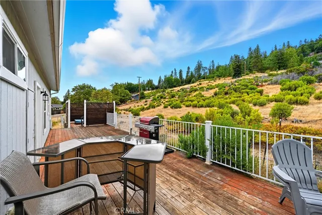 a view of a balcony with furniture