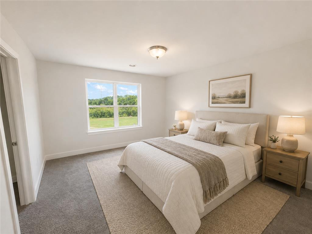 3104 Moyer Road Hellertown, PA 18055 - Photo 14 of 30 A well-proportioned bedroom features soft carpeting and a window framing peaceful country views.