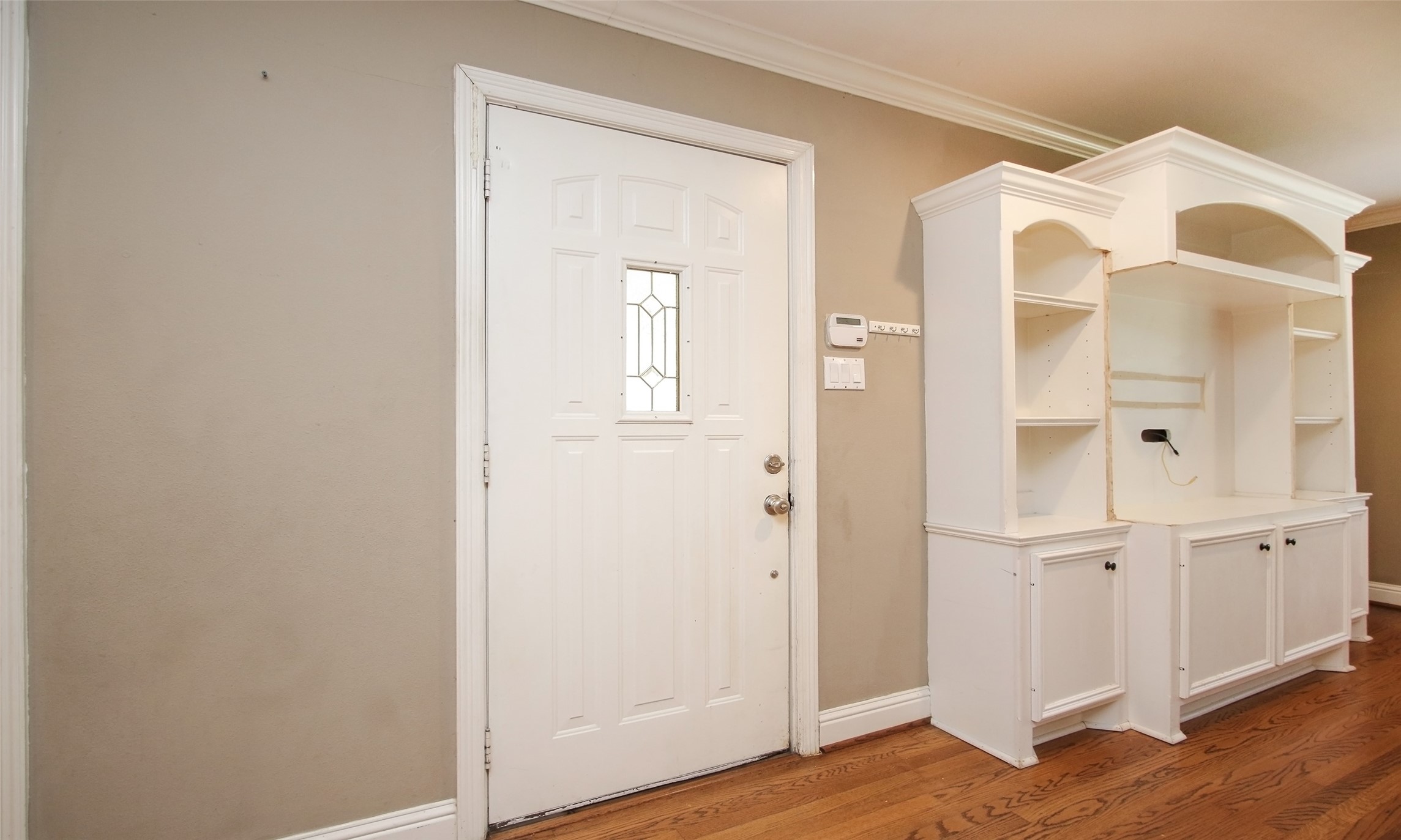 4809 Saxon Street Bellaire, TX 77401 - Photo 6 of 34 wooden floor with white walls