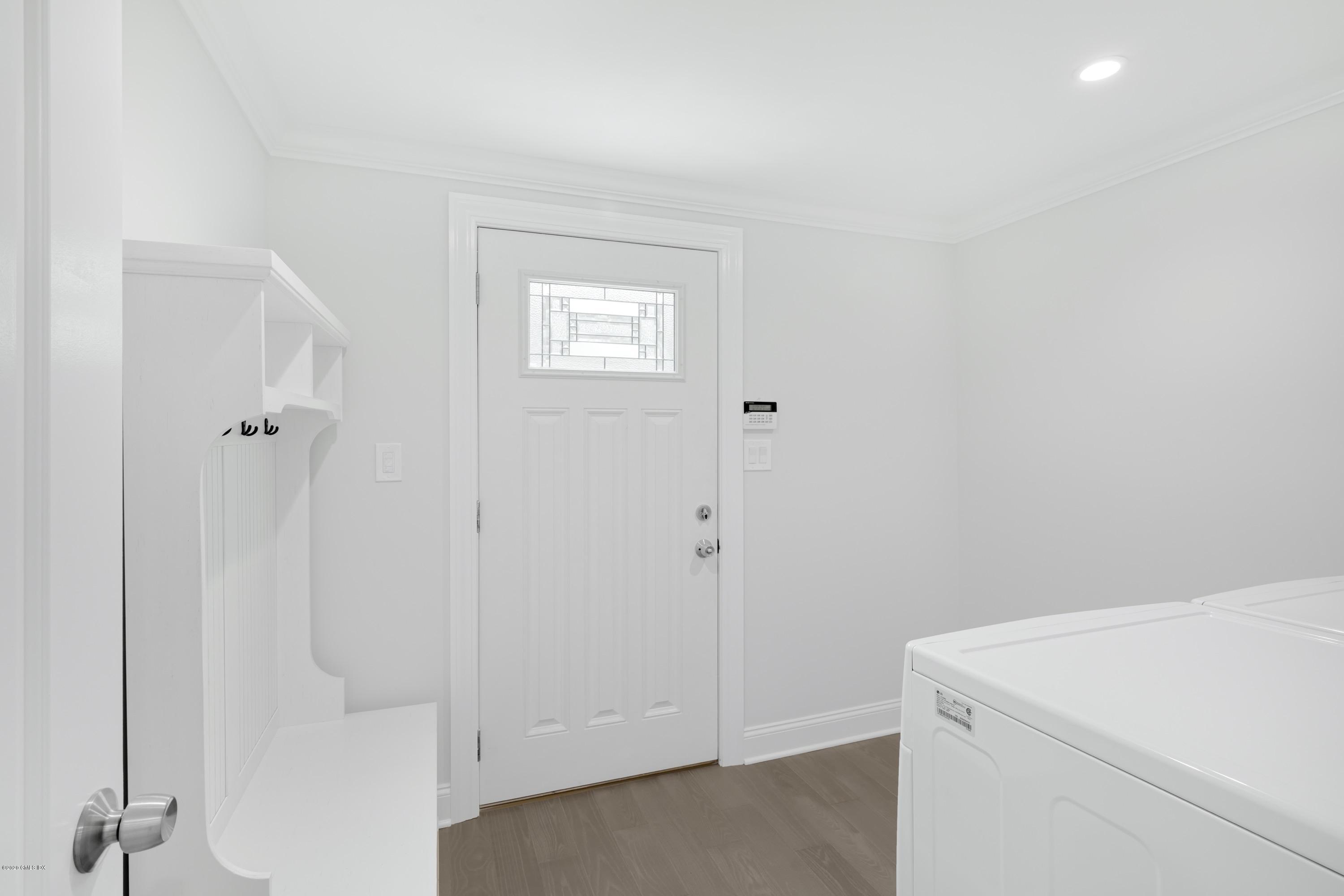 142 Old Mill Road Greenwich, CT 06831 - Photo 17 of 23 a utility room with dryer and washer