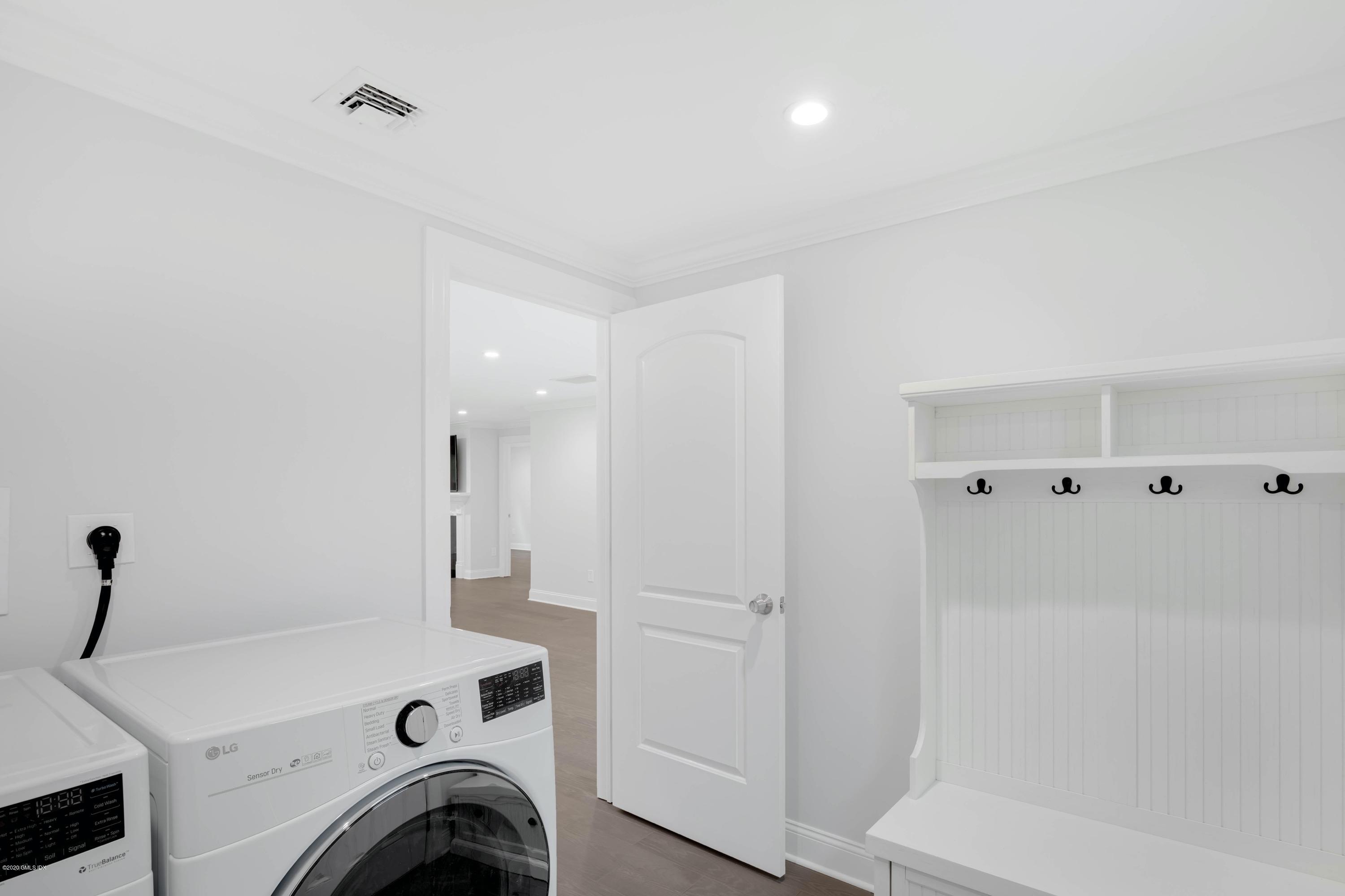 142 Old Mill Road Greenwich, CT 06831 - Photo 18 of 23 a view of entryway with washer and dryer