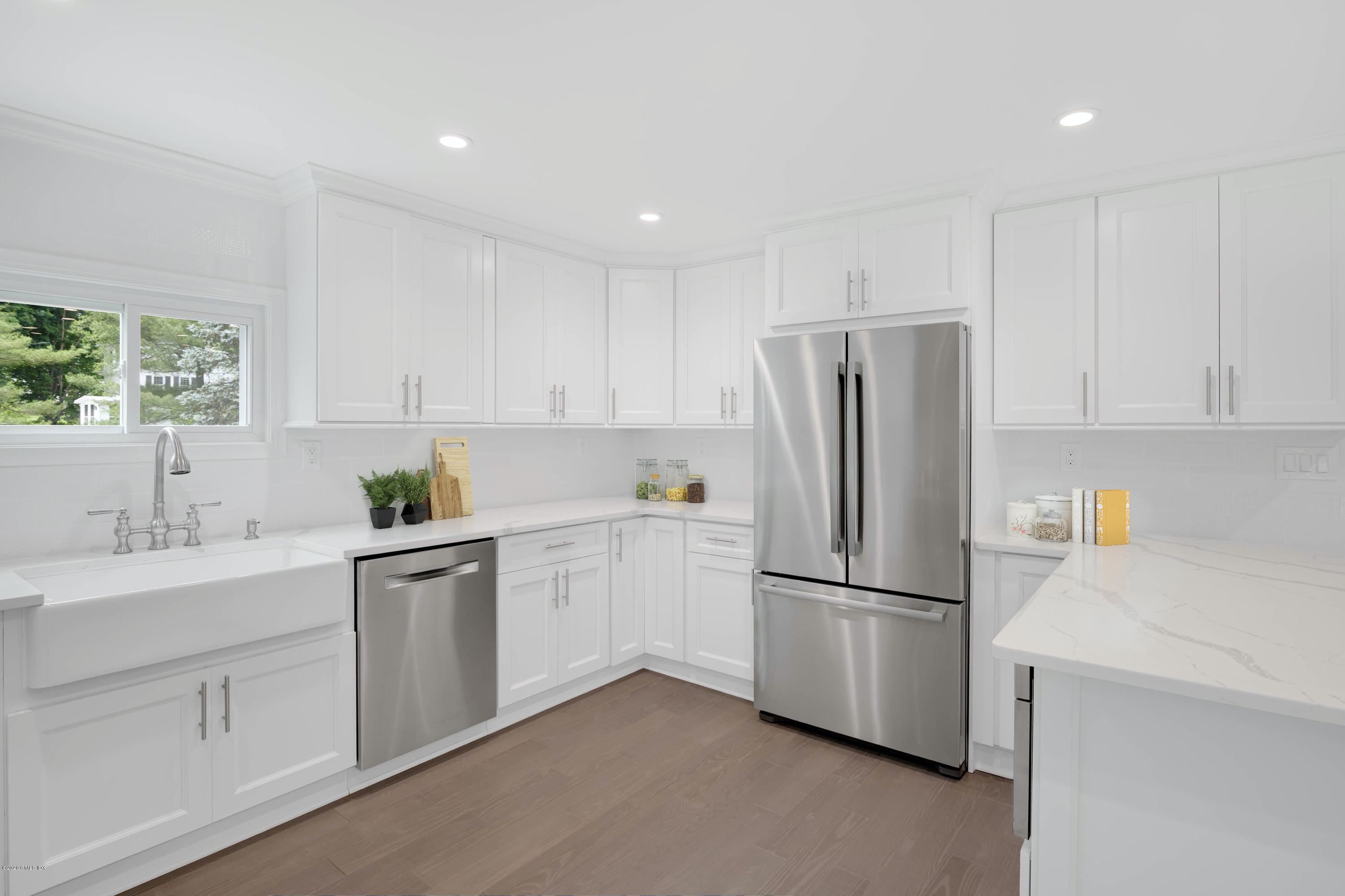 142 Old Mill Road Greenwich, CT 06831 - Photo 6 of 23 a kitchen with appliances a sink and a window