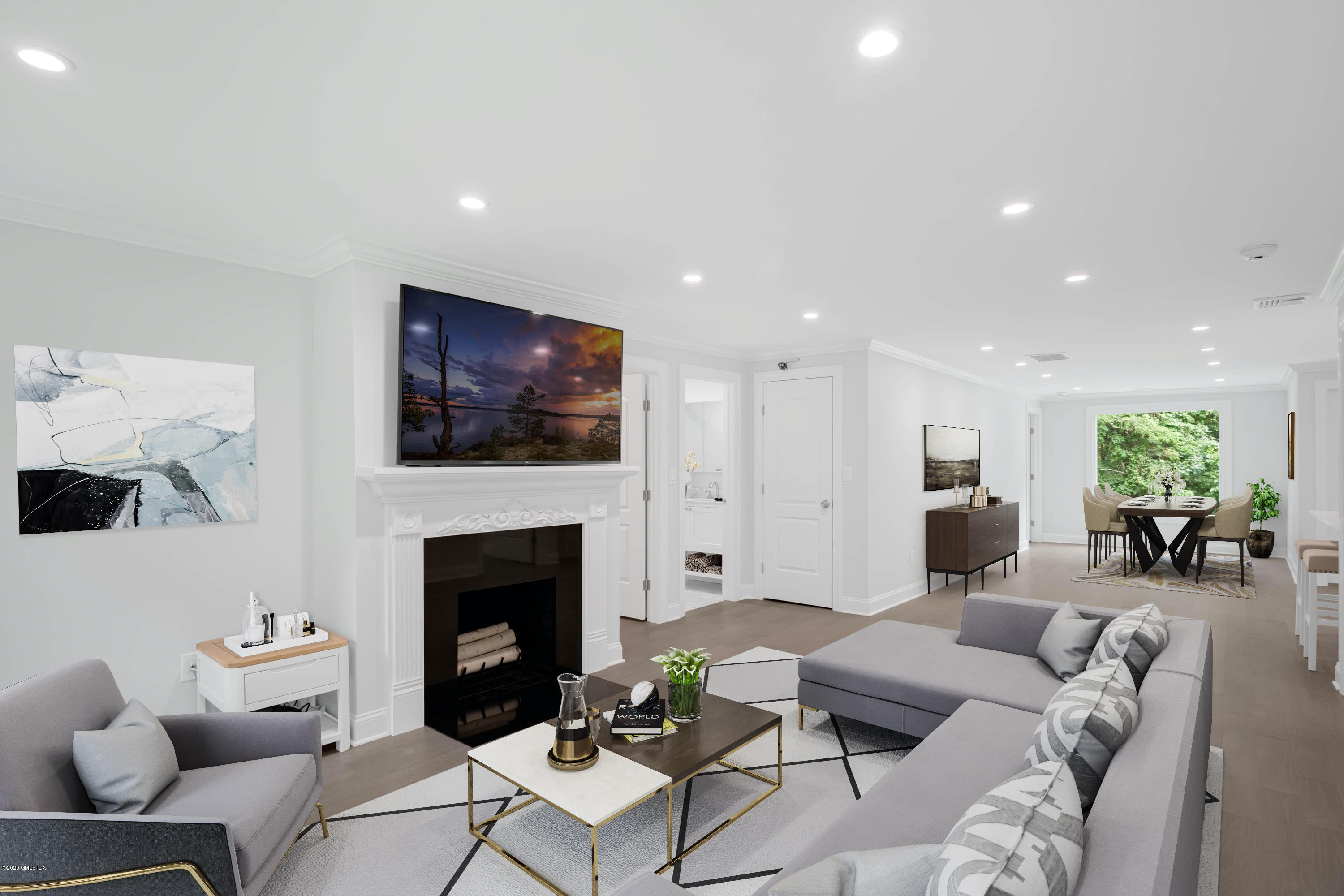 142 Old Mill Road Greenwich, CT 06831 - Photo 9 of 23 a living room with furniture a flat screen tv and a fireplace