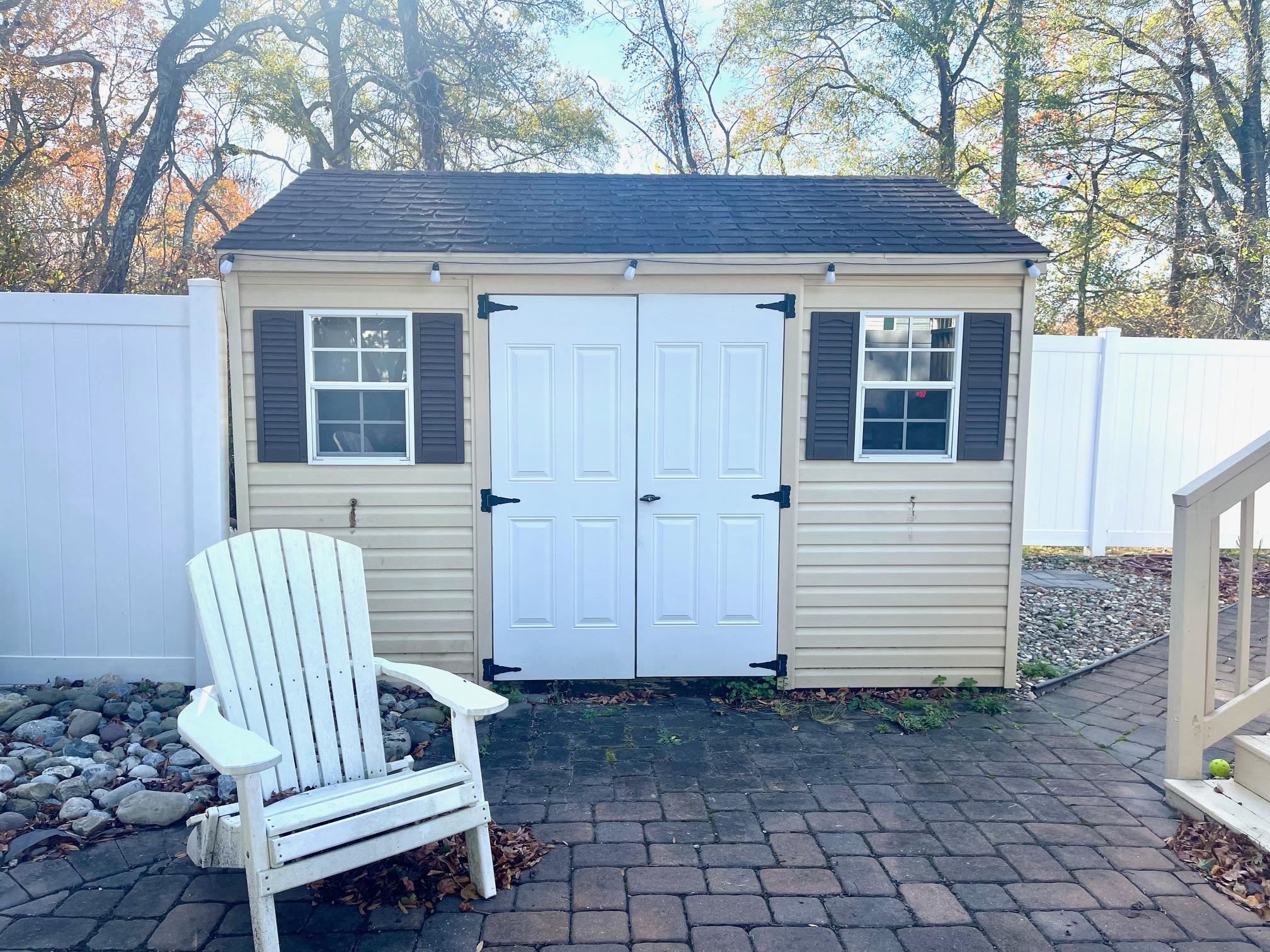 4100 Rte 9 South, Unit 56 Rio Grande, NJ 08242 - Photo 21 of 30 a view of a chair and table in backyard of the house