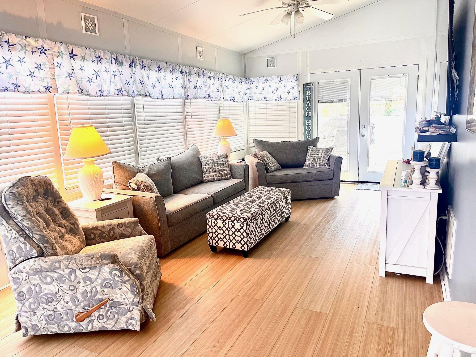 4100 Rte 9 South, Unit 56 Rio Grande, NJ 08242 - Photo 6 of 30 a living room with furniture and a wooden floor