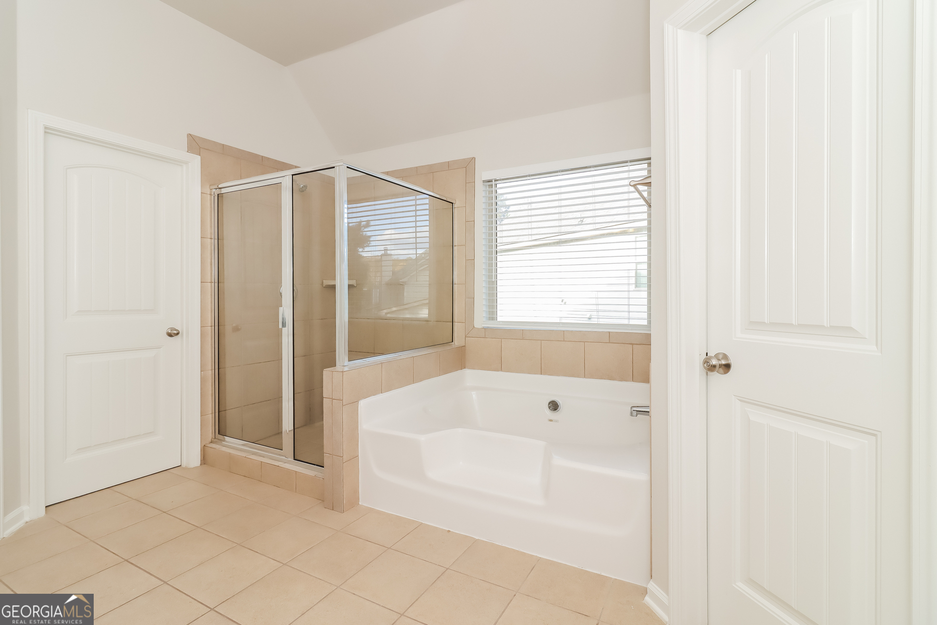 194 Randy Way Dallas, GA 30132 - Photo 10 of 17 a bathroom with a bathtub and a shower