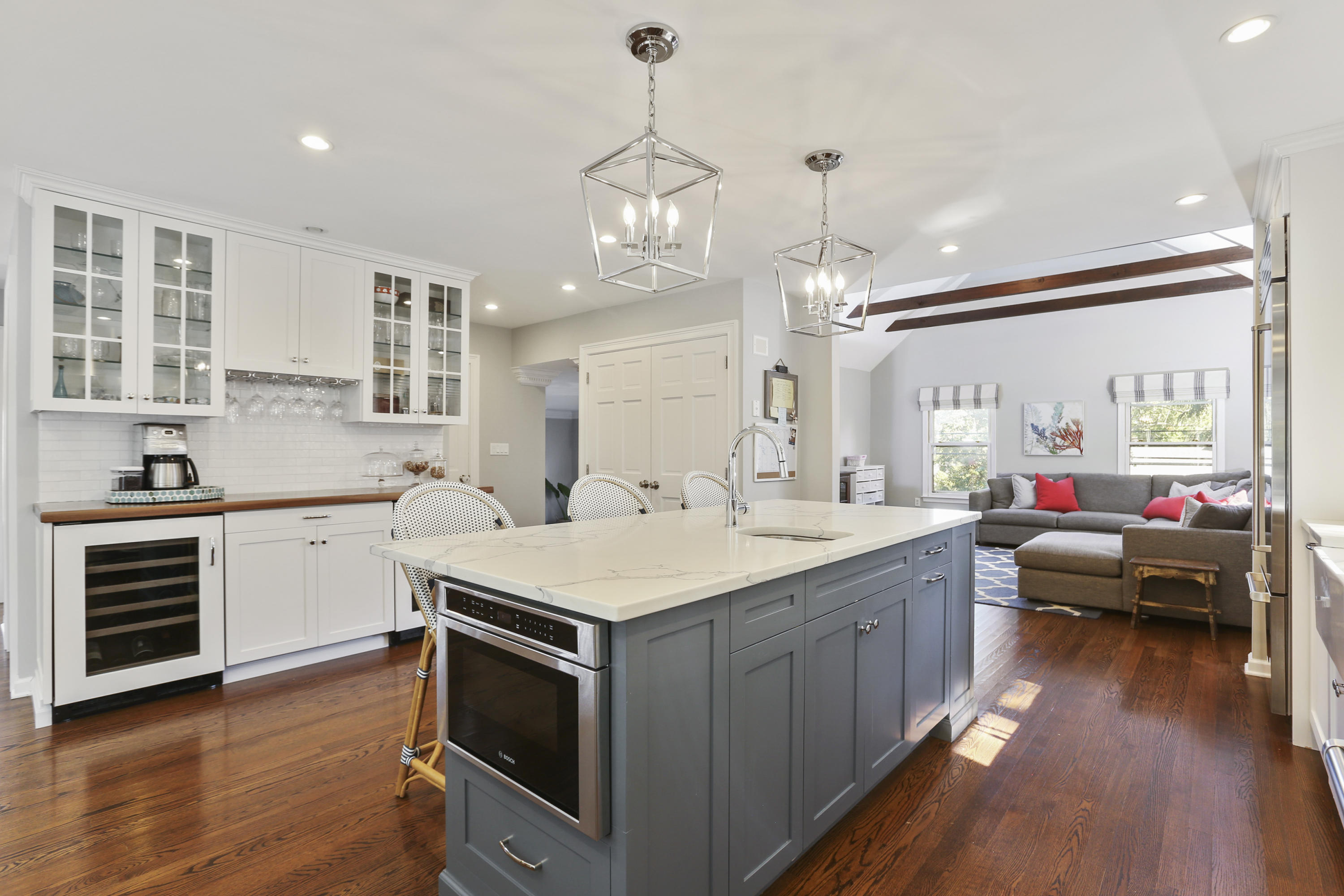 91 Gardiner Street Darien, CT 06820 - Photo 12 of 33 a kitchen with a stove a sink and wooden floor