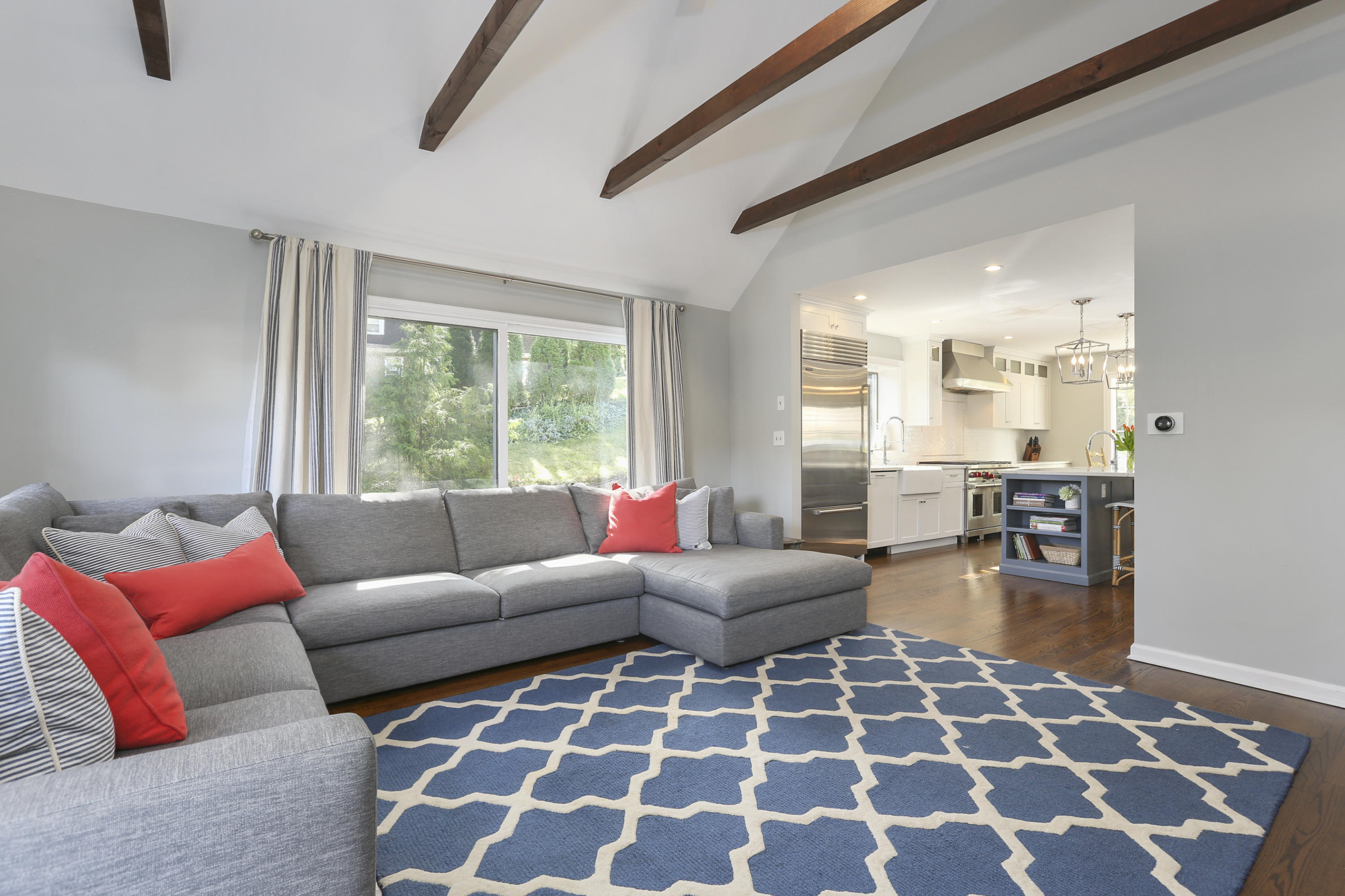 91 Gardiner Street Darien, CT 06820 - Photo 15 of 33 a living room with furniture and a rug