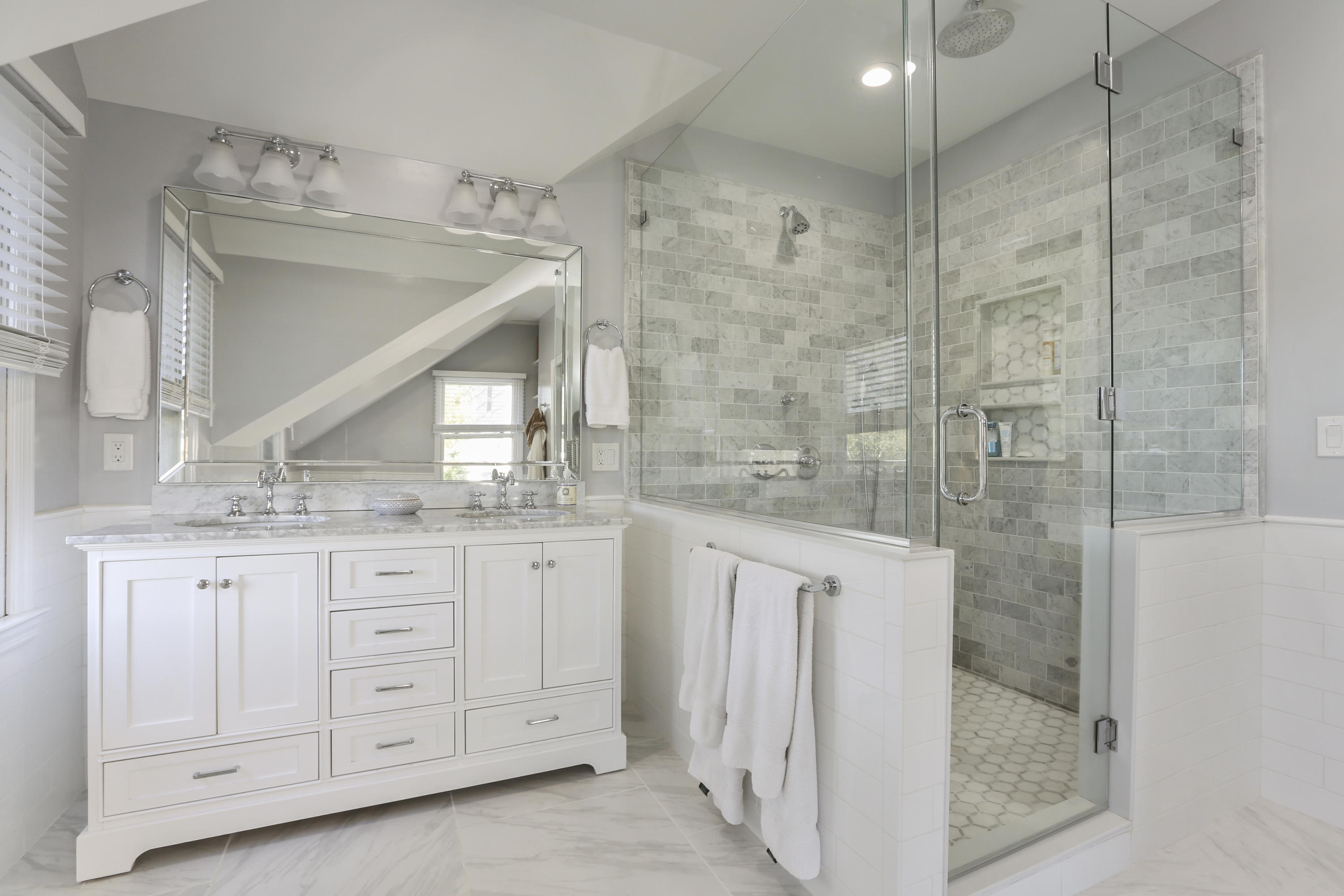 91 Gardiner Street Darien, CT 06820 - Photo 19 of 33 a bathroom with a granite countertop sink a mirror and a shower
