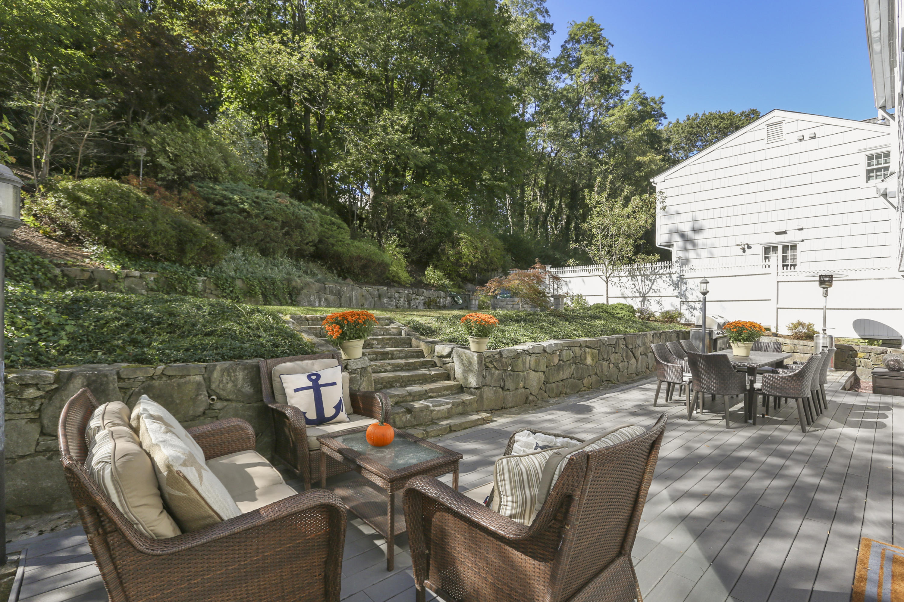 91 Gardiner Street Darien, CT 06820 - Photo 28 of 33 an outdoor living area with furniture and a garden