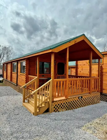 a view of a house with wooden deck