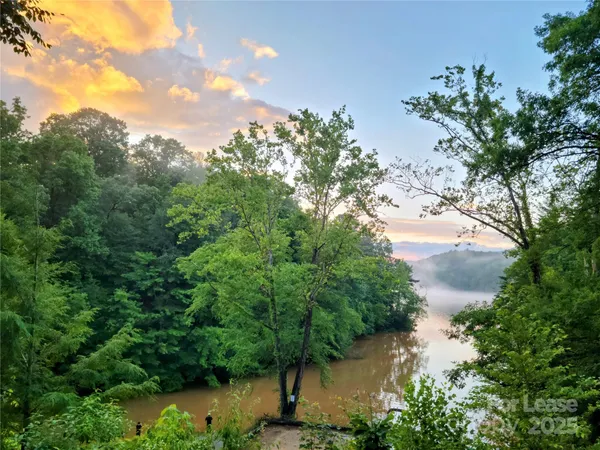 a view of a lake with top of house