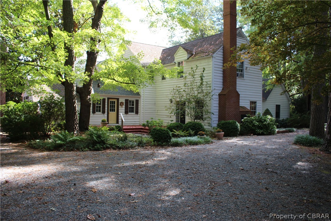 331 Thurston Road Mathews, VA 23109 - Photo 48 of 50 a view of a house with a tree and plants
