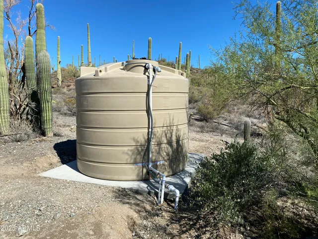 a view of a pathway with a field