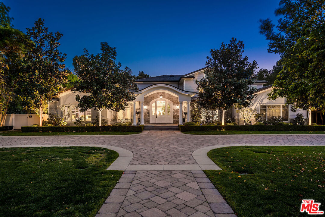23924 Long Valley Road Hidden Hills, CA 91302 - Photo 2 of 46 a view of a street with a building in the background