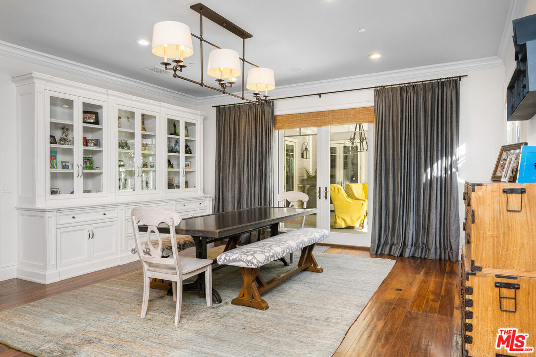 23924 Long Valley Road Hidden Hills, CA 91302 - Photo 17 of 46 a living room with furniture and a table