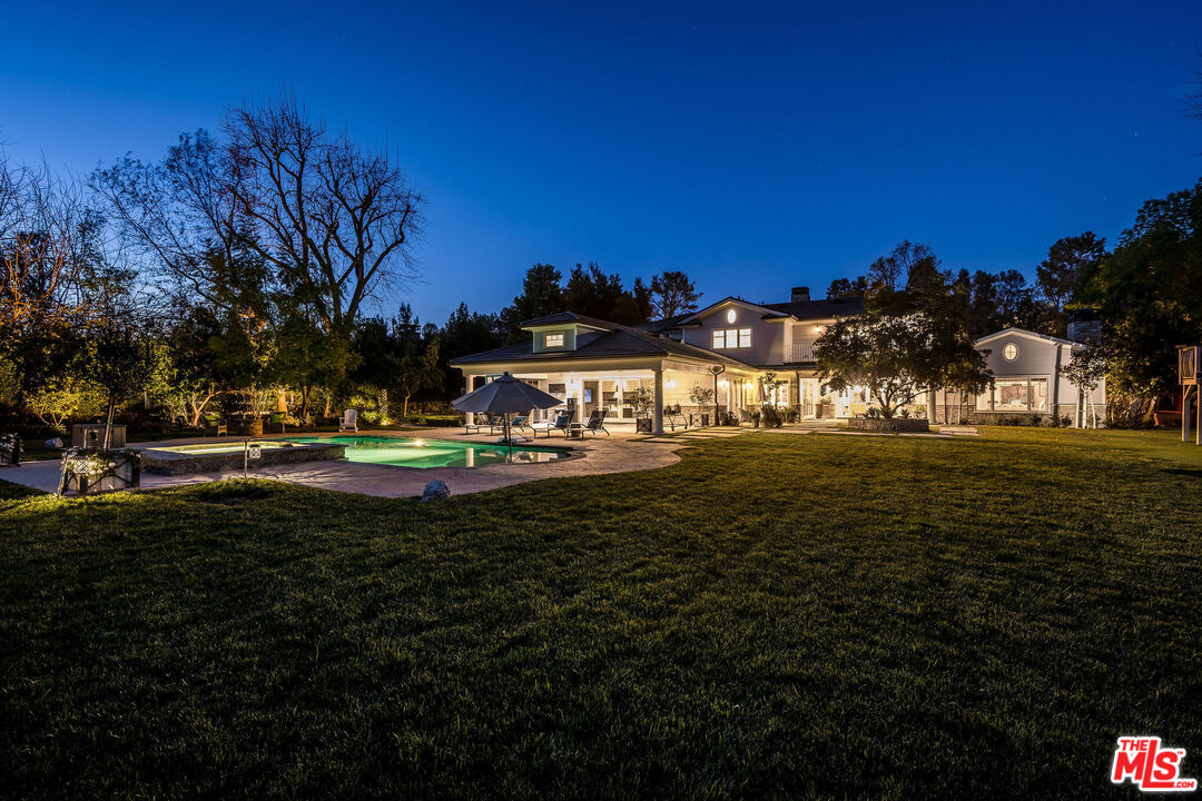 23924 Long Valley Road Hidden Hills, CA 91302 - Photo 46 of 46 a view of a house with a big yard
