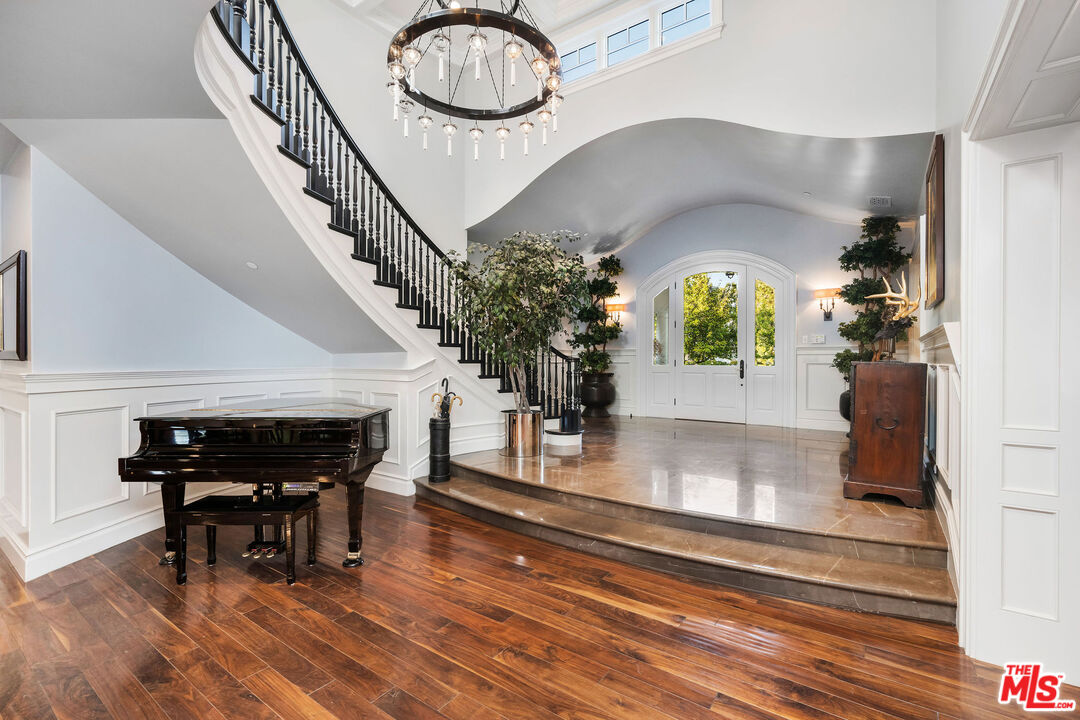 23924 Long Valley Road Hidden Hills, CA 91302 - Photo 7 of 46 a view of entryway and hall with wooden floor