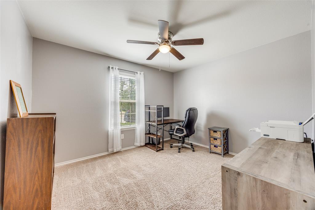 1011 Riverstone Trail Princeton, TX 75407 - Photo 15 of 26 a workspace with furniture and a window
