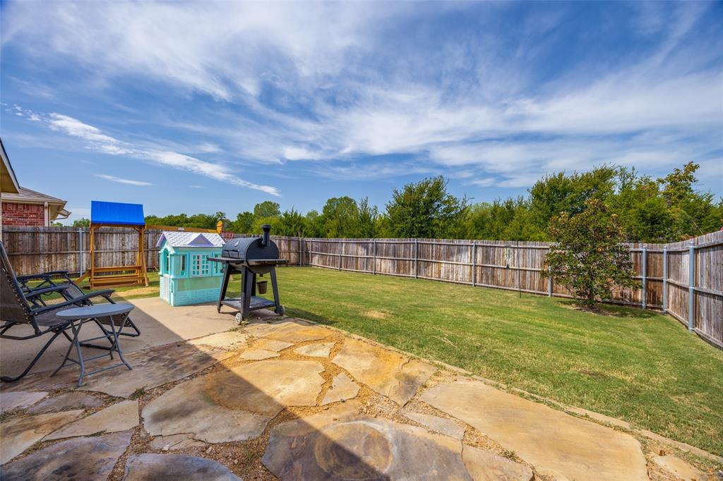 1011 Riverstone Trail Princeton, TX 75407 - Photo 23 of 26 a view of a garden with houses