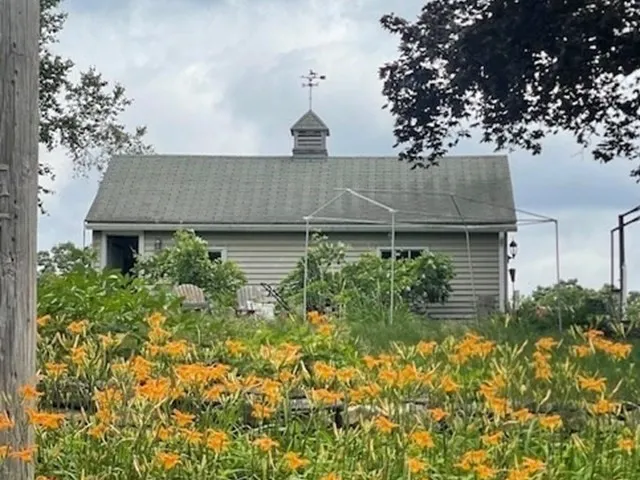 a house view with a garden space