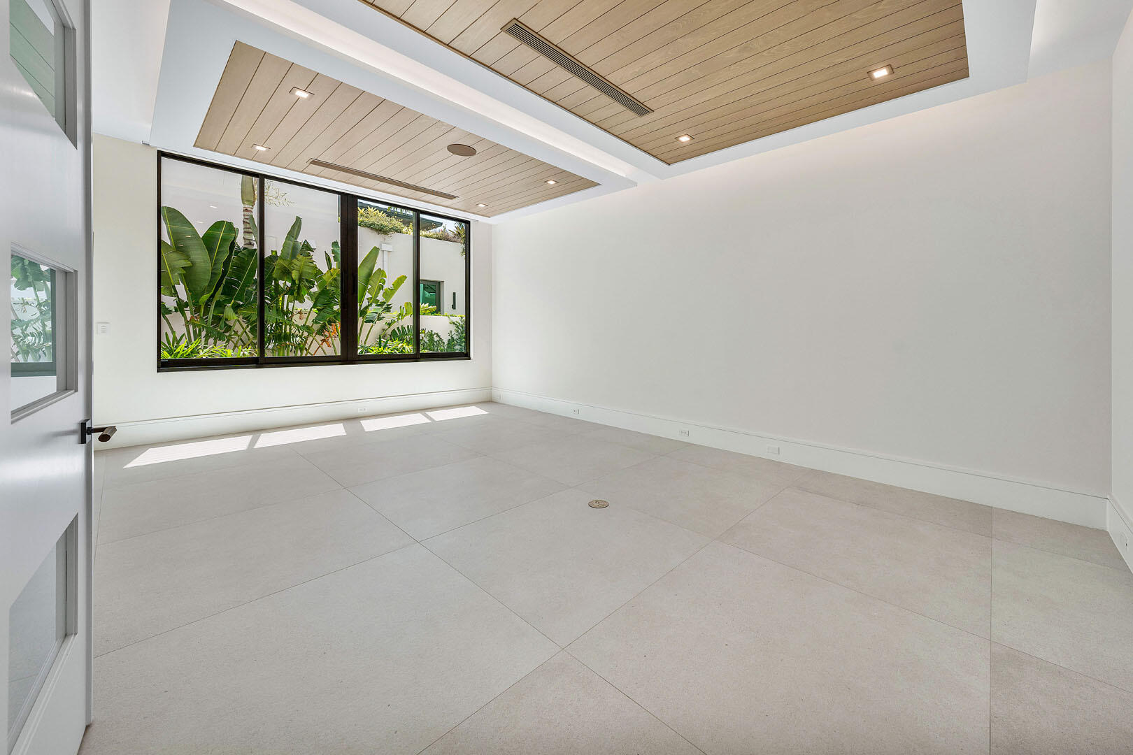191 Coconut Palm Road Boca Raton, FL 33432 - Photo 34 of 81 a view of an empty room with a window
