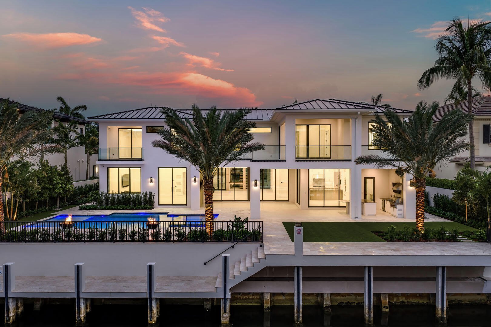 191 Coconut Palm Road Boca Raton, FL 33432 - Photo 68 of 81 a front view of a house with a yard